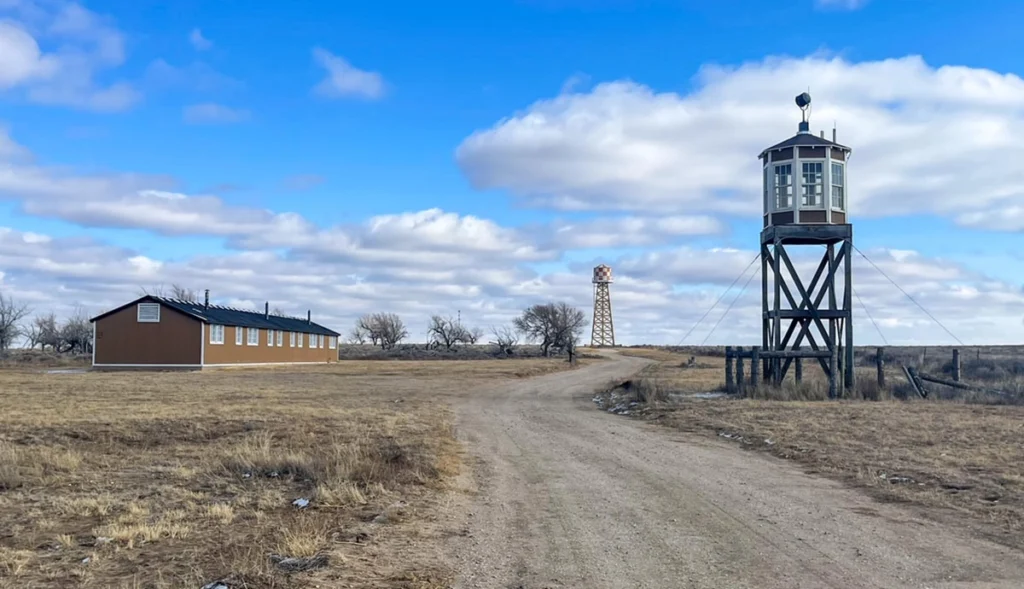 View of Guard Tower Barracks and Water Tower in Amache Relocation Camp