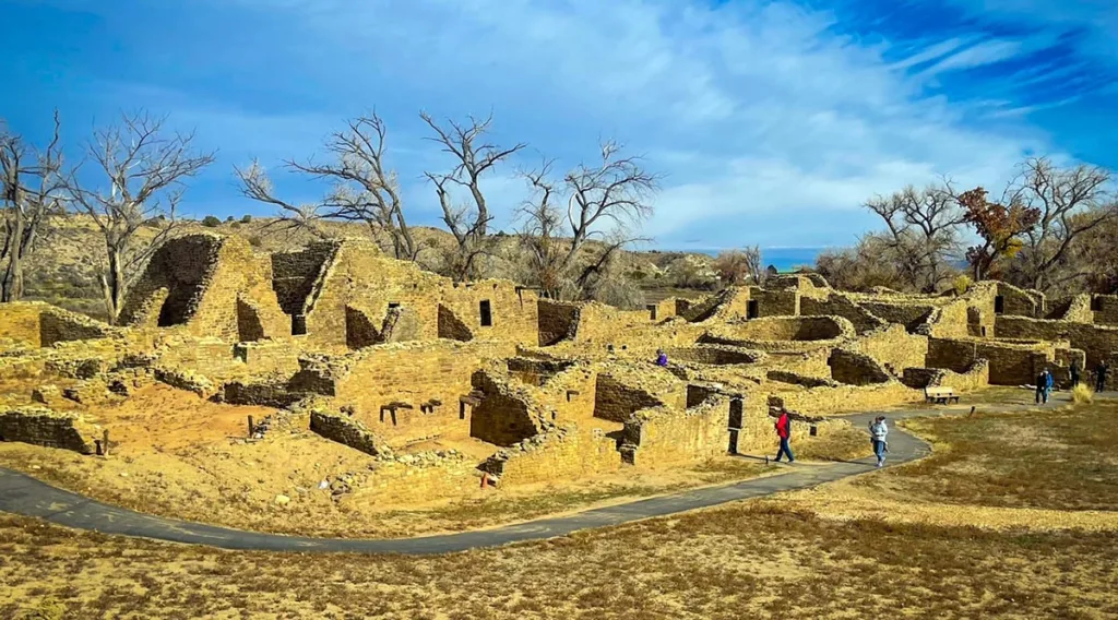 People Exploring Aztec Ruins National Monument